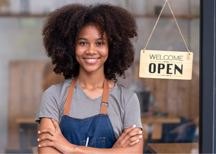 A worker outside of a business.