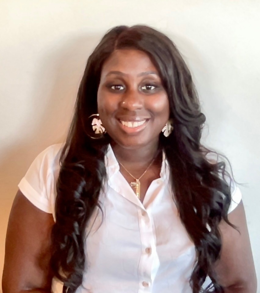 woman with long hair in white shirt