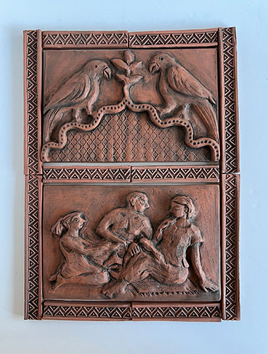 Terracotta relief of two birds and three people.