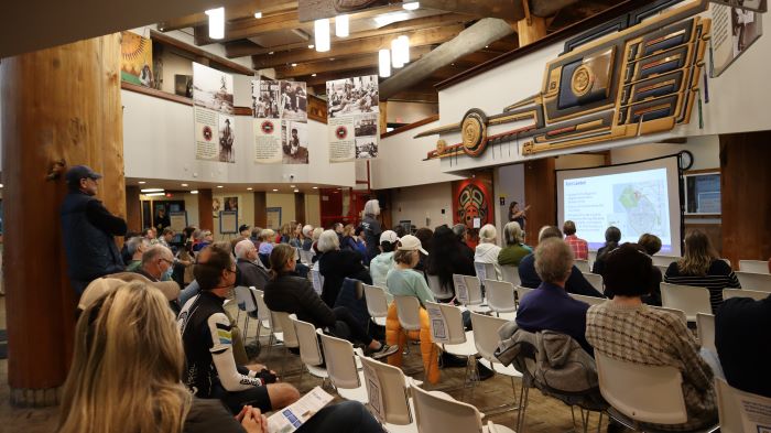 audience listening to a presentation at the Daybreak Star Indian Cultural Center