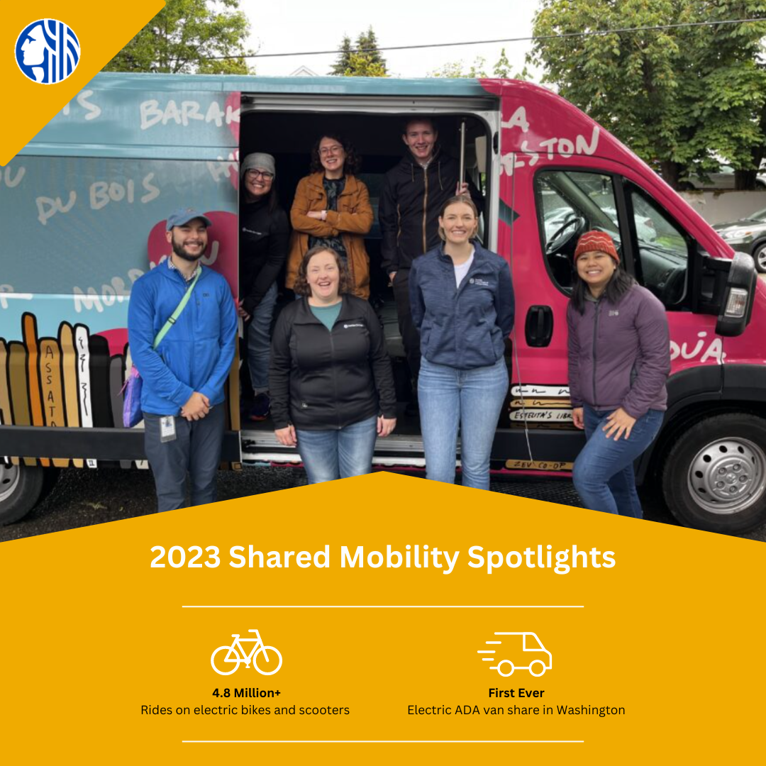 Staff from City Light and SDOT staff celebrate the launch of an ADA-accessible electric vanshare program hosted by Estelita&rsquo;s Library.