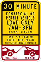 Sign with 30 minute Commercial or permit vehicle load only times and dates and car being towed