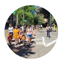 Pedestrians crossing a wide crosswalk