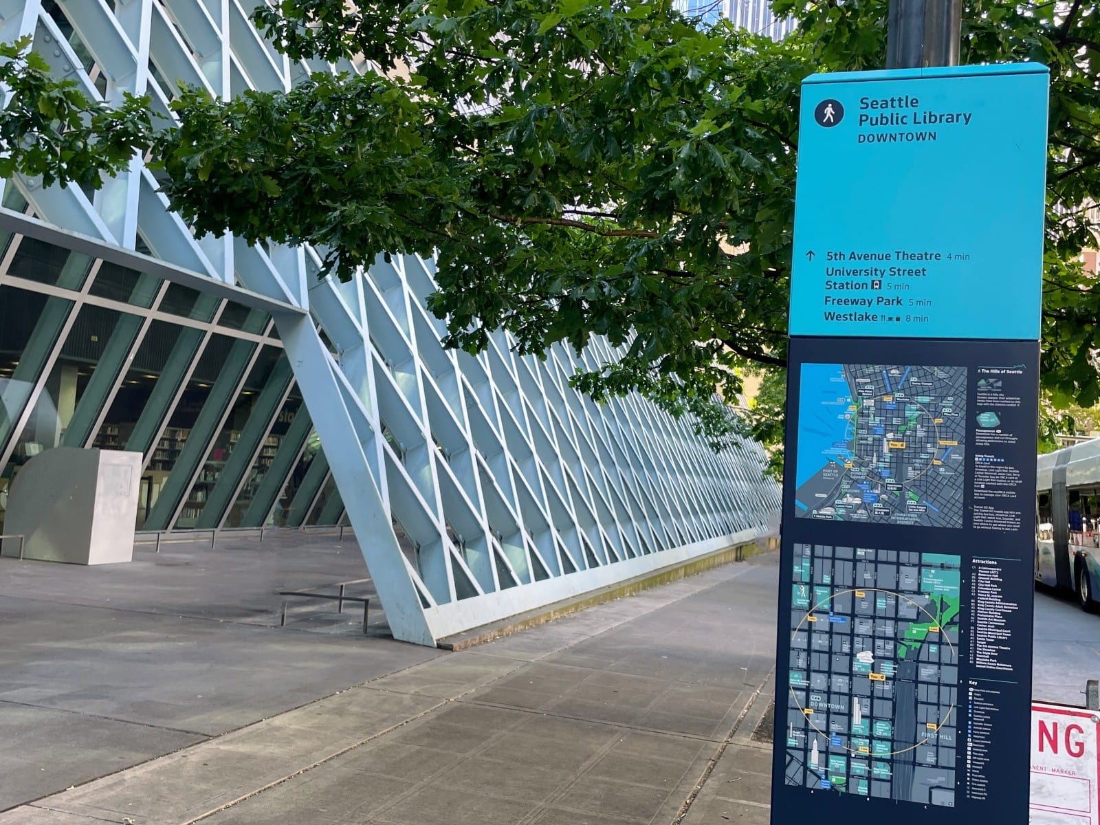 an image showing a wayfinding map installed in a city, near by the Seattle Public Library