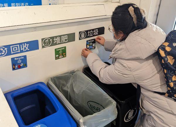 Placing labels on bins in a restaurant.