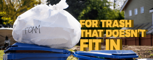 Foam blocks in a bag on a recycling bin with text "For trash that doesn't fit in."