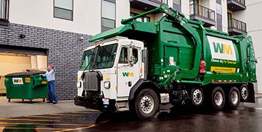 Front load solid waste collection truck