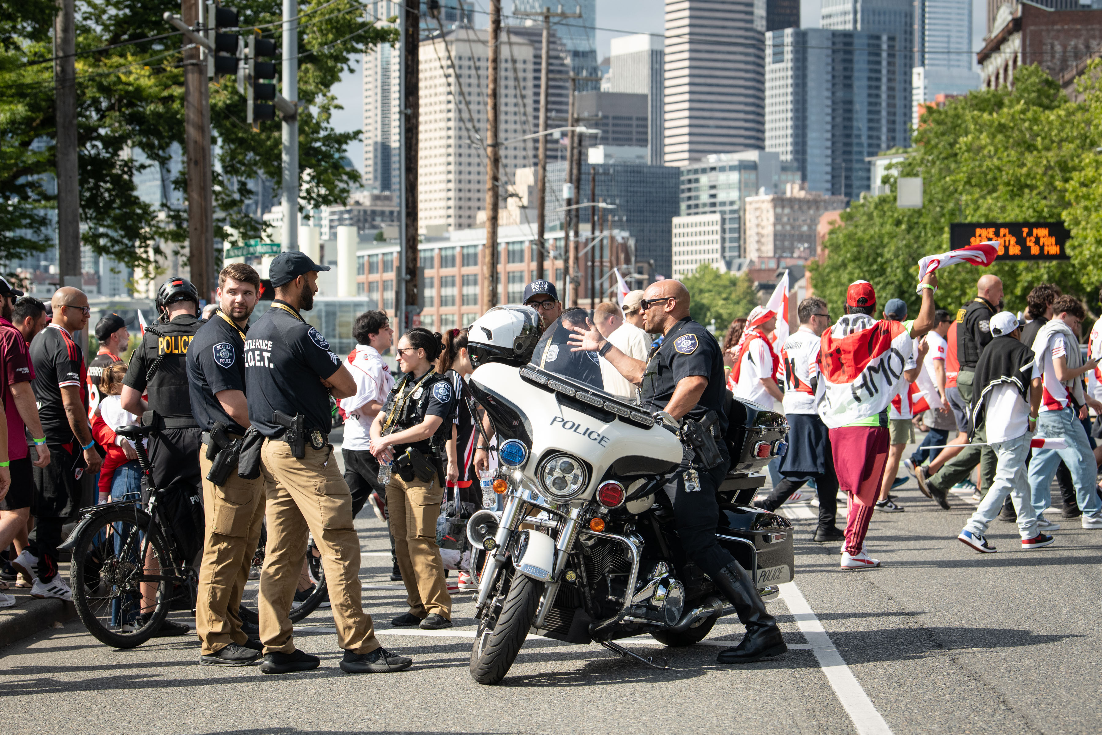 Poet officers standing near crowd