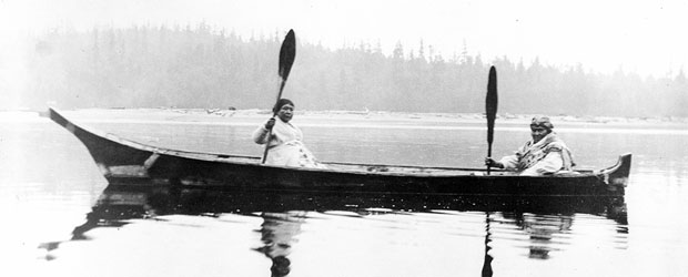 Jenny Davis and Annie Rodgers in front of Indianola in the Rodger&rsquo;s family canoe. 
