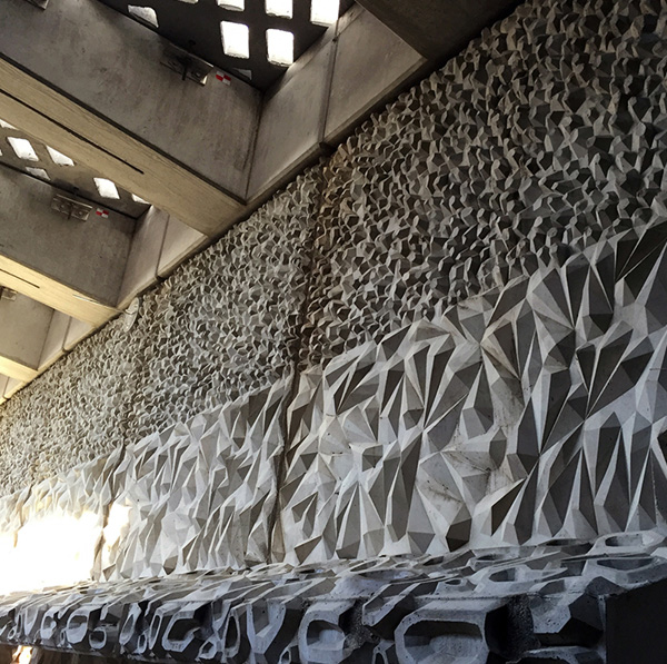 View of the texture of Seawall Strata and the light diffusing panels above bringing light into the area