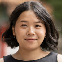 Caitlin has shoulder-length black hair.