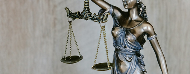 Lady justice holding up a scale