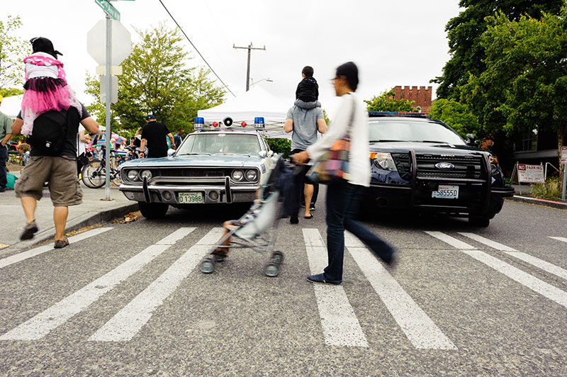 Pedestrians crossing the street at a crosswalk