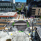 An aerial view of the protected intersection looking east along Thomas 