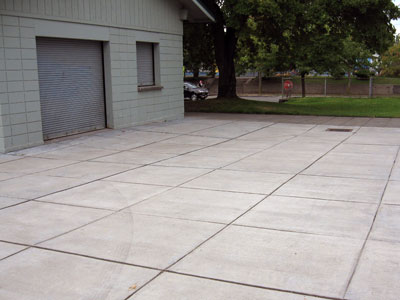 Cement and/or concrete areas outside buildings are another type of impervious surface that can drain into the stormwater system. 