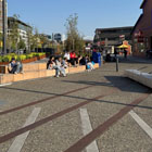 People walking and sitting on benches on the Promenade